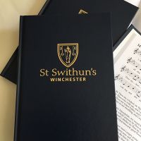 St Swithun's hymn book cover and pages